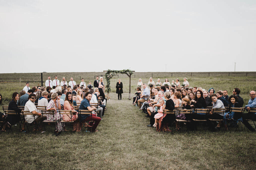 outdoor prairie wedding ceremony in a field https://www.thegathered.ca