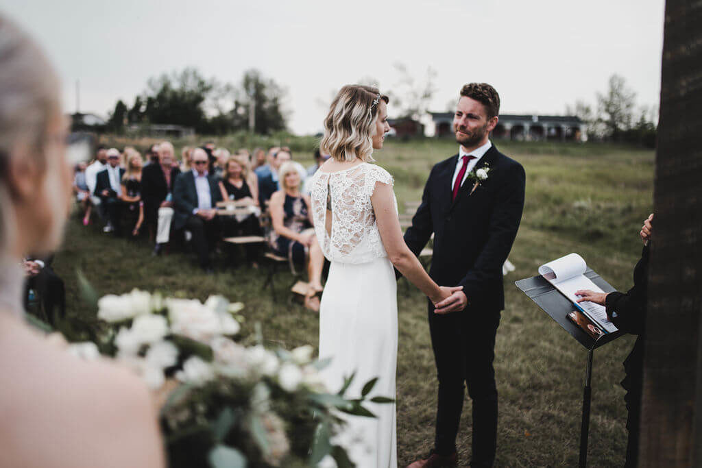 outdoor wedding ceremony  in a prairie field https://www.thegathered.ca
