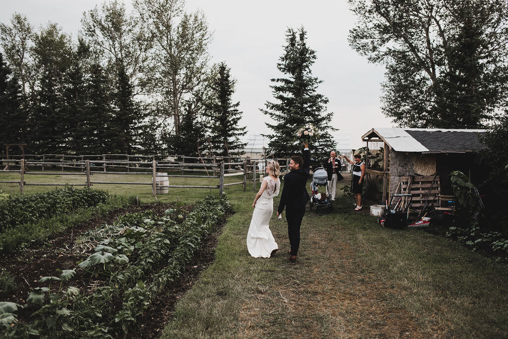 fun farm cocktail hour, surrounded by gardens and farm animals for their wedding https://www.thegathered.ca
