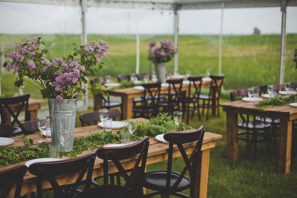 lilac wedding florals in galvanized buckets make for the perfect center piece for any spring wedding. www.thegathered.ca