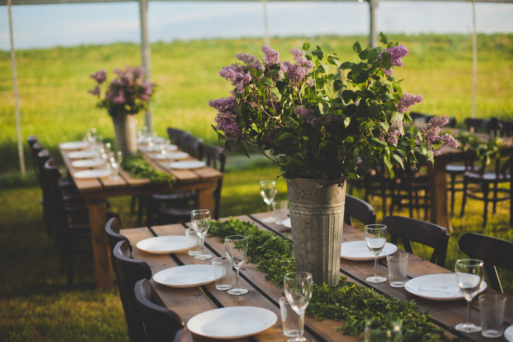 lilac wedding florals in galvanized buckets make for the perfect center piece for any spring wedding. www.thegathered.ca