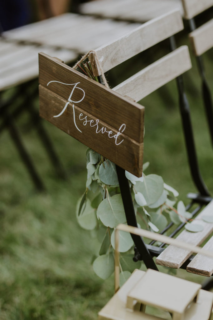 outdoor wedding wooden reserved seating sign