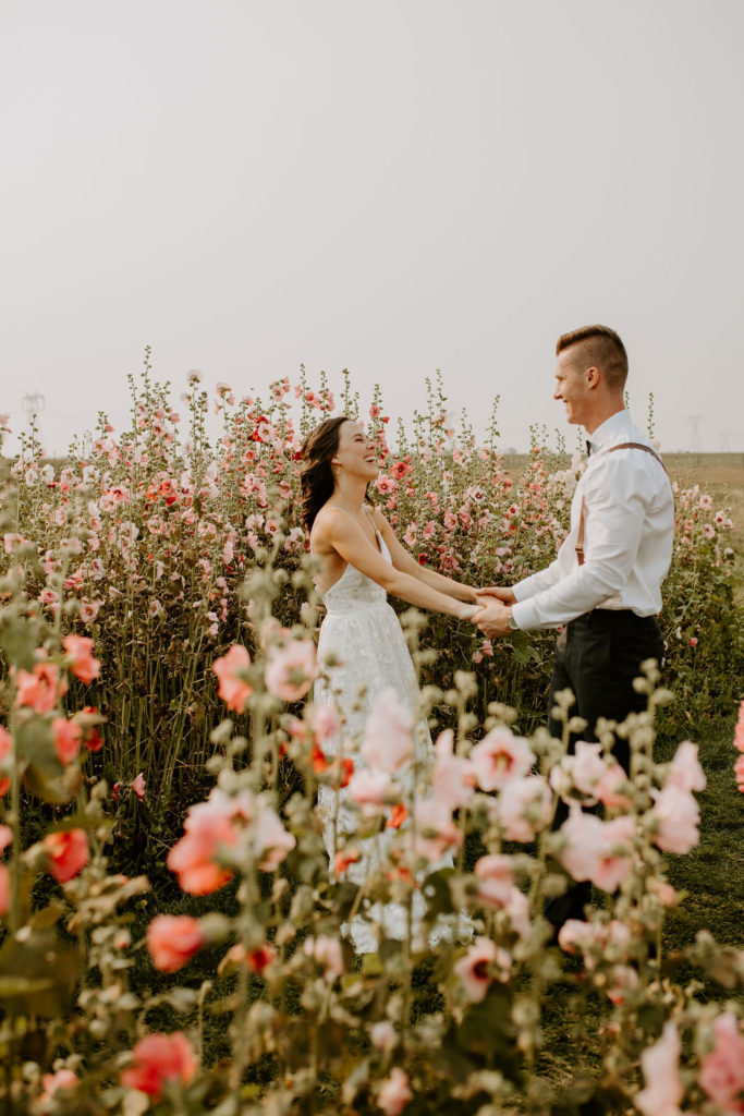 Brett and Haley - Pink Hollyhocks and A Warm Summer Breeze, in Alberta, Canada. The Gathered