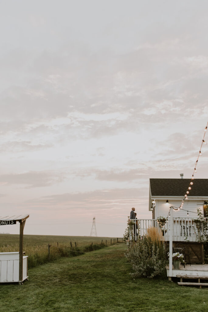 A wedding at a farm in the middle of a field.